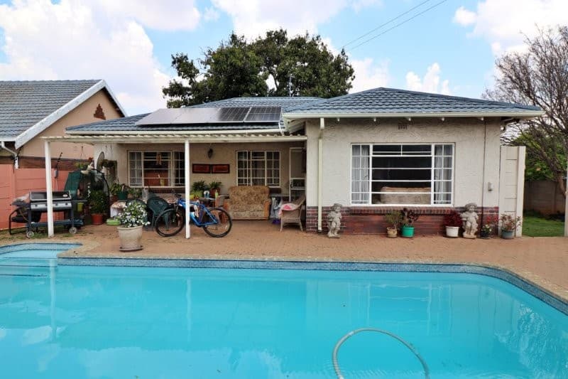 A Charming Family Home with Solar Power & a Pool!